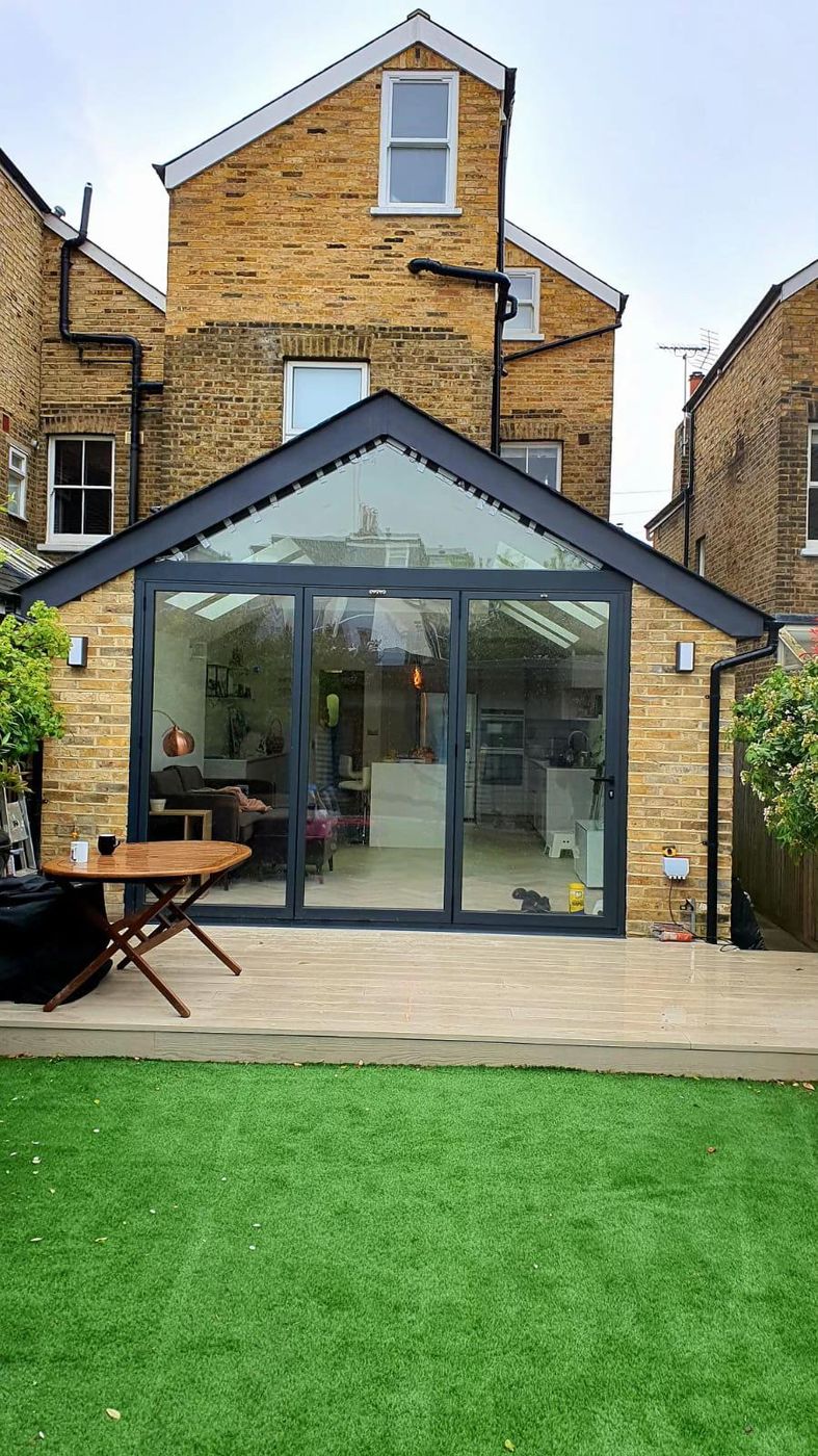 Glazed gable extension on a London stock brick house